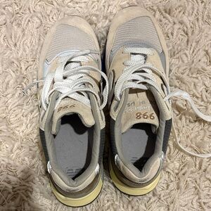 New Balance Beige and Gray Sneakers with Blue Accents